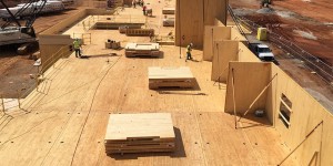 Cross Laminated Timber (CLT) panel floors and walls under construction.