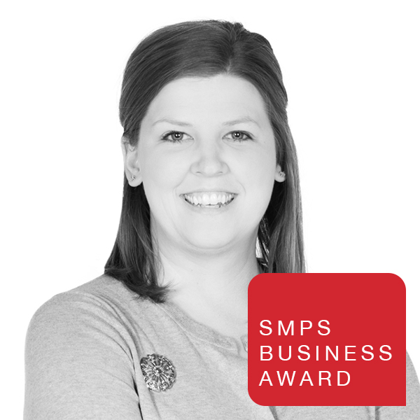 Meg Mueller, Schaefer Business Development Manager, walked across the stage to receive the Greater Cincinnati Chapter of Society for Marketing Professional Services (SMPS) Business Developer of the Year Award.