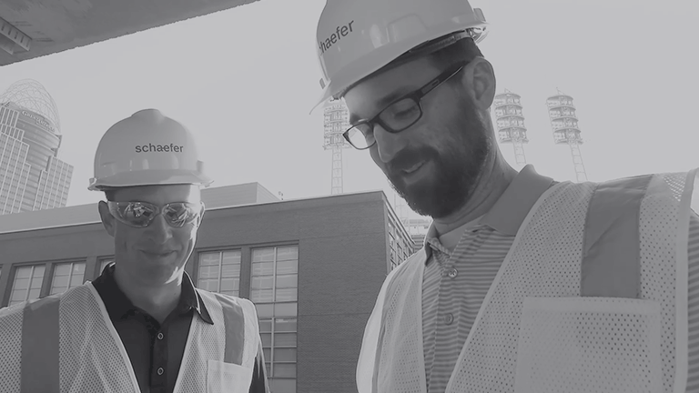 Grayscale shot of Schaefer engineers on a job site in Cincinnati, Ohio.