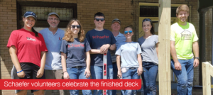 Schaefer volunteers celebrate the finished deck