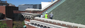 The team inspects the roof at the University of Cincinnati Dieterle Hall in Cincinnati, Ohio.