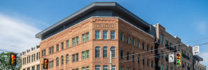 The F.W. Beeker building offers multi-family housing atop of first floor commercial spaces in Columbus, Ohio.