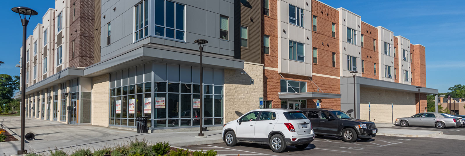 View of the Avondale Center with first-floor commercial space + multi-story housing.