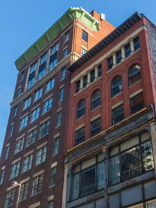 Looking up at the historic Reakirt + Brunswick buildings in downtown Cincinnati, Ohio.