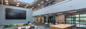 Open collaboration space surrounded by classrooms in the addition at Little Miami High School.